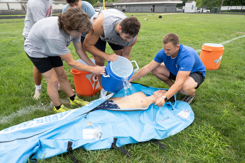 Heat Illness and Equipment Laden Athlete Banner